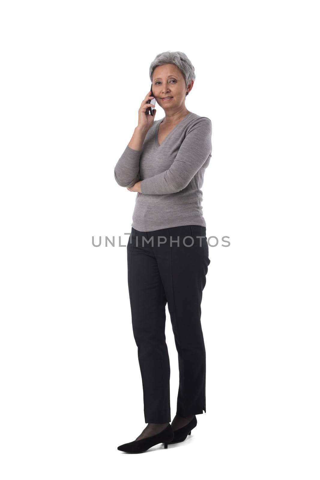 Asian business woman with mobile phone by ALotOfPeople