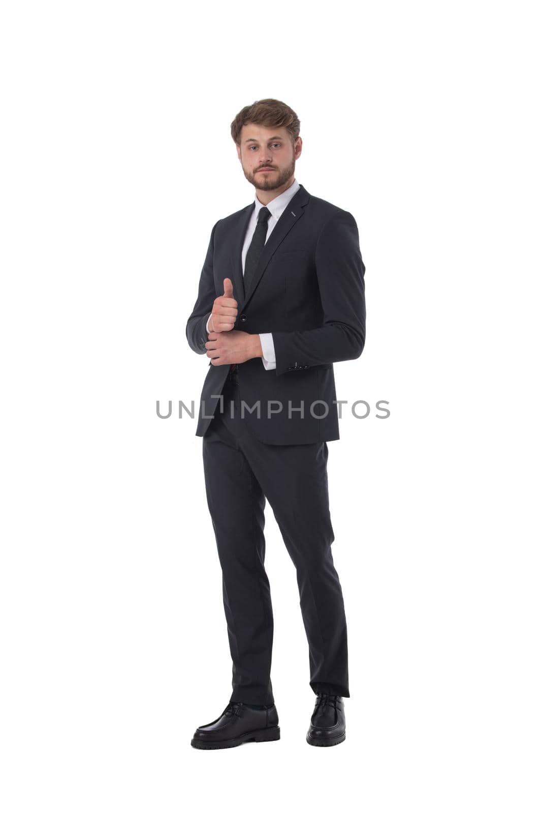 Full length of handsome businessman in formal wear giving thumbs up isolated on white background
