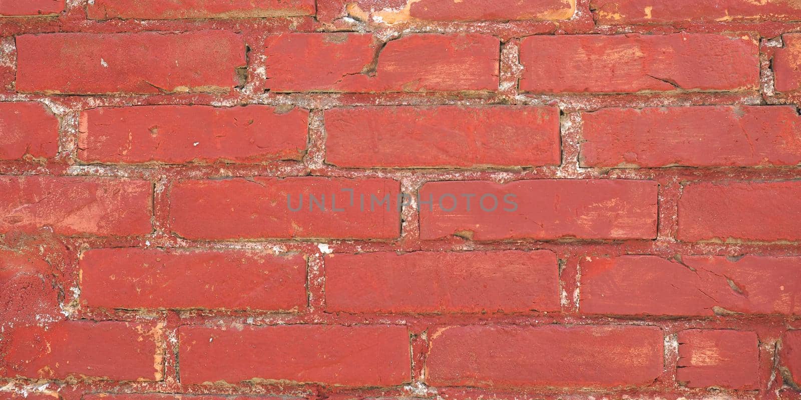 wide 4K red brick wall background by claudiodivizia