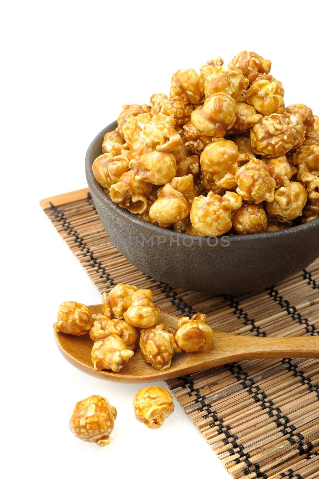 caramel popcorn isolated on white background