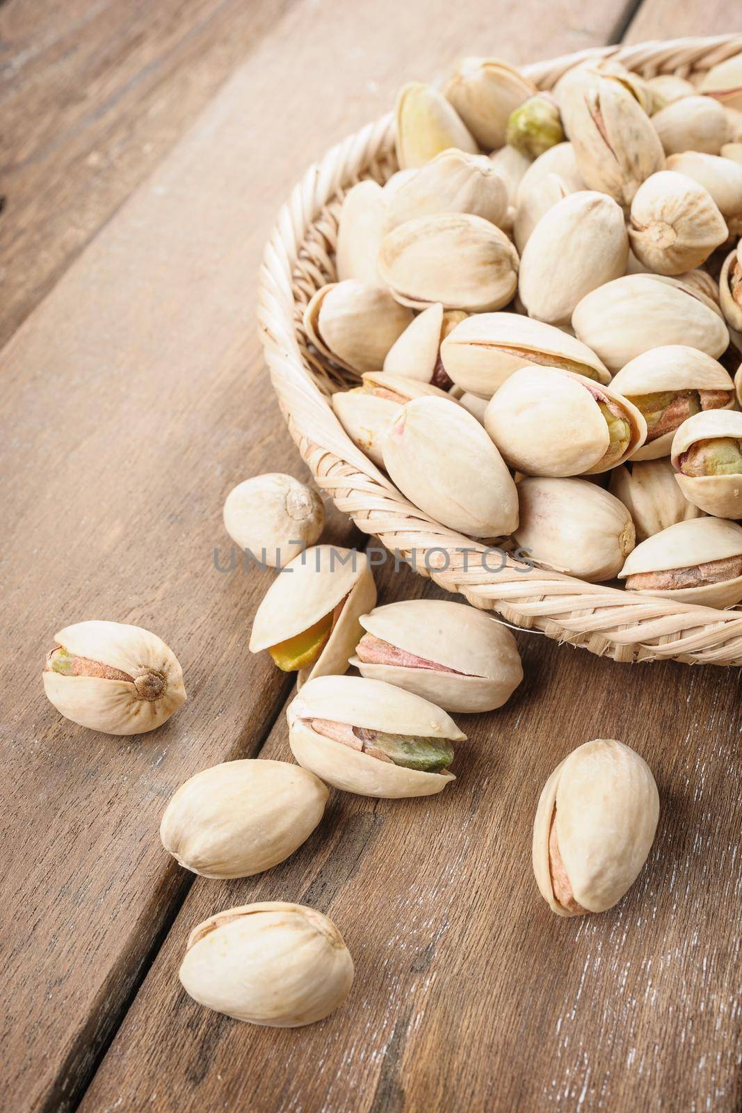 closeup roasted and cracked pistachios