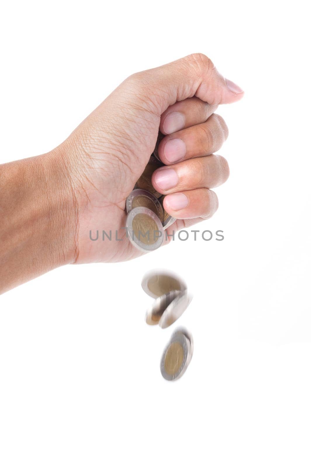 hand releasing Thai coins isolated on white background