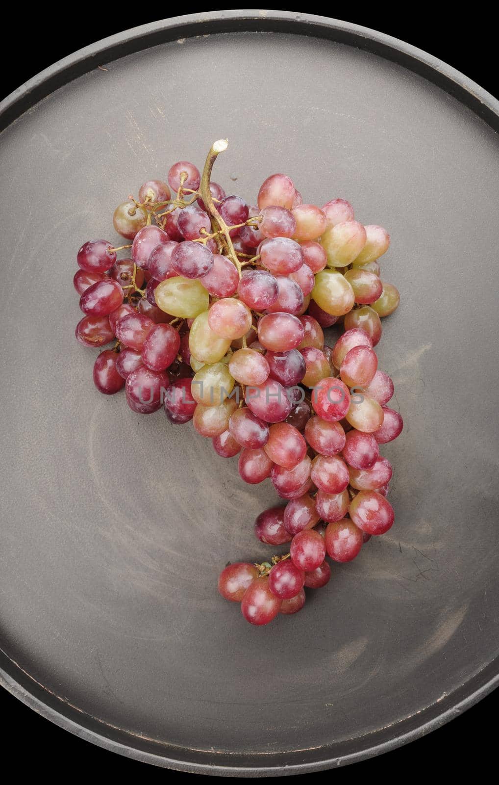 isolated fresh red grapes bunch