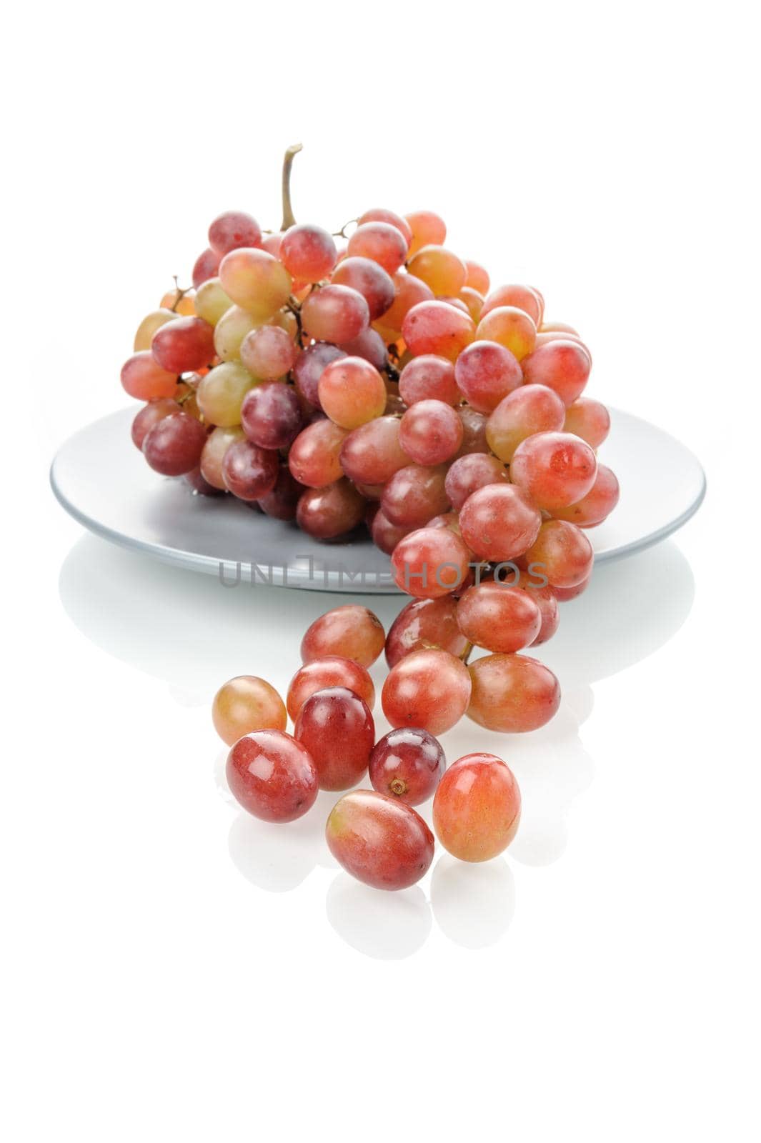 isolated fresh red grapes bunch on white background