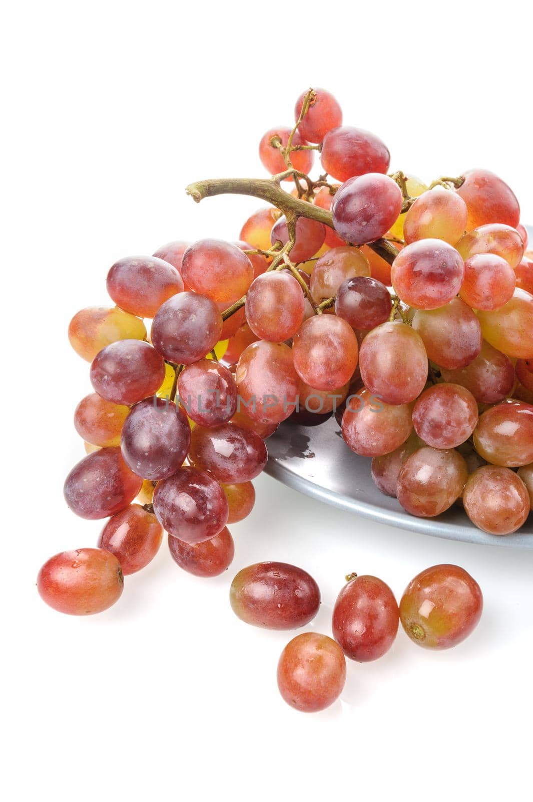 isolated fresh red grapes bunch on white background