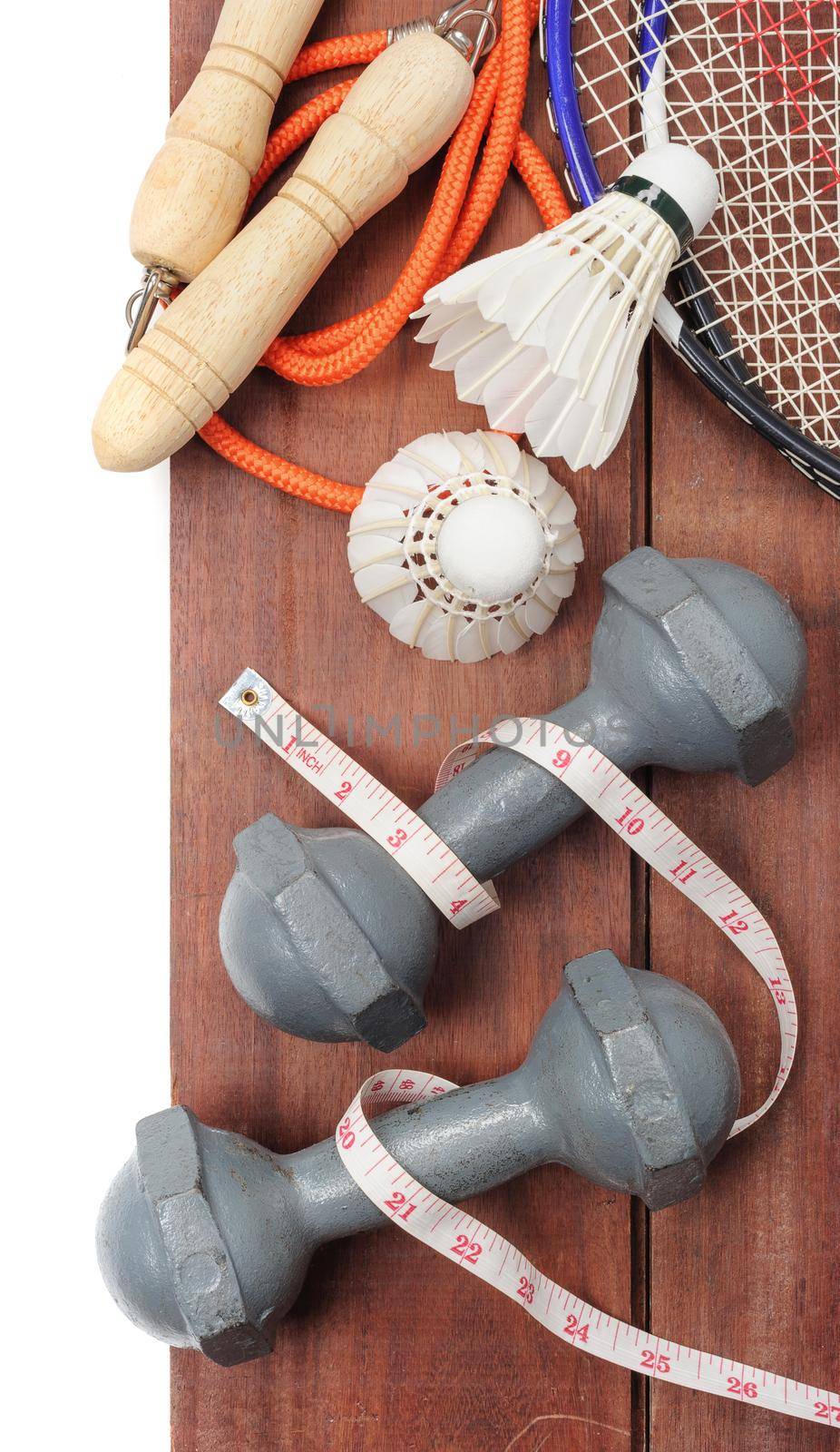 sport equipments on wooden plank background