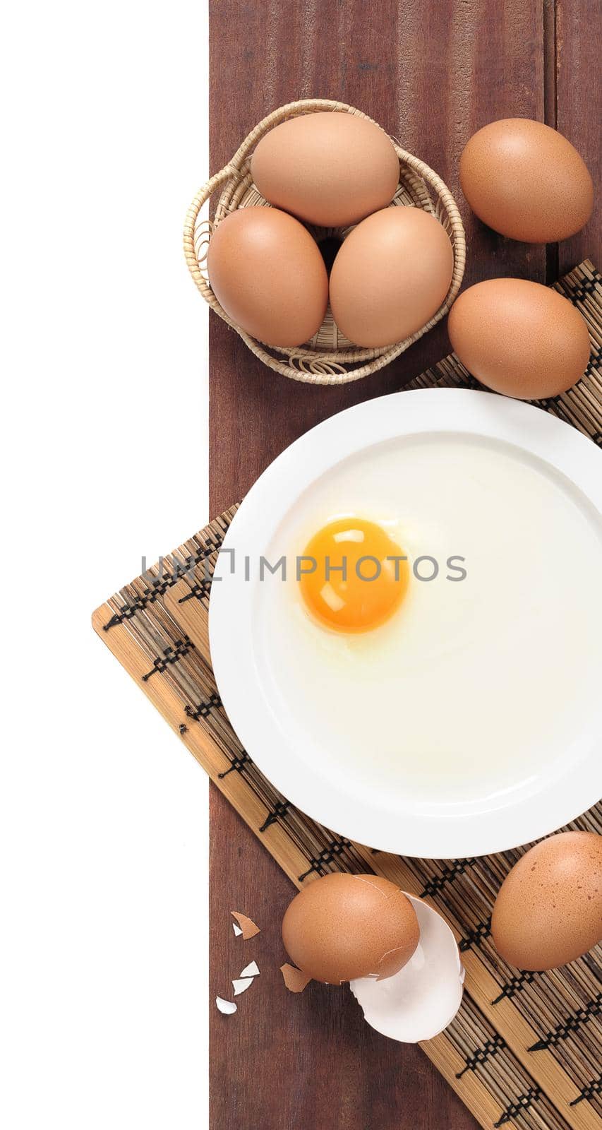 closeup fresh eggs isolate on wooden plank background