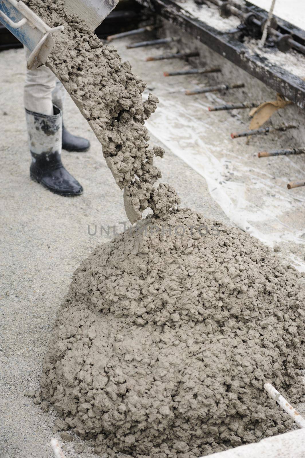 mixed concrete pouring at construction site, Construction industry concept