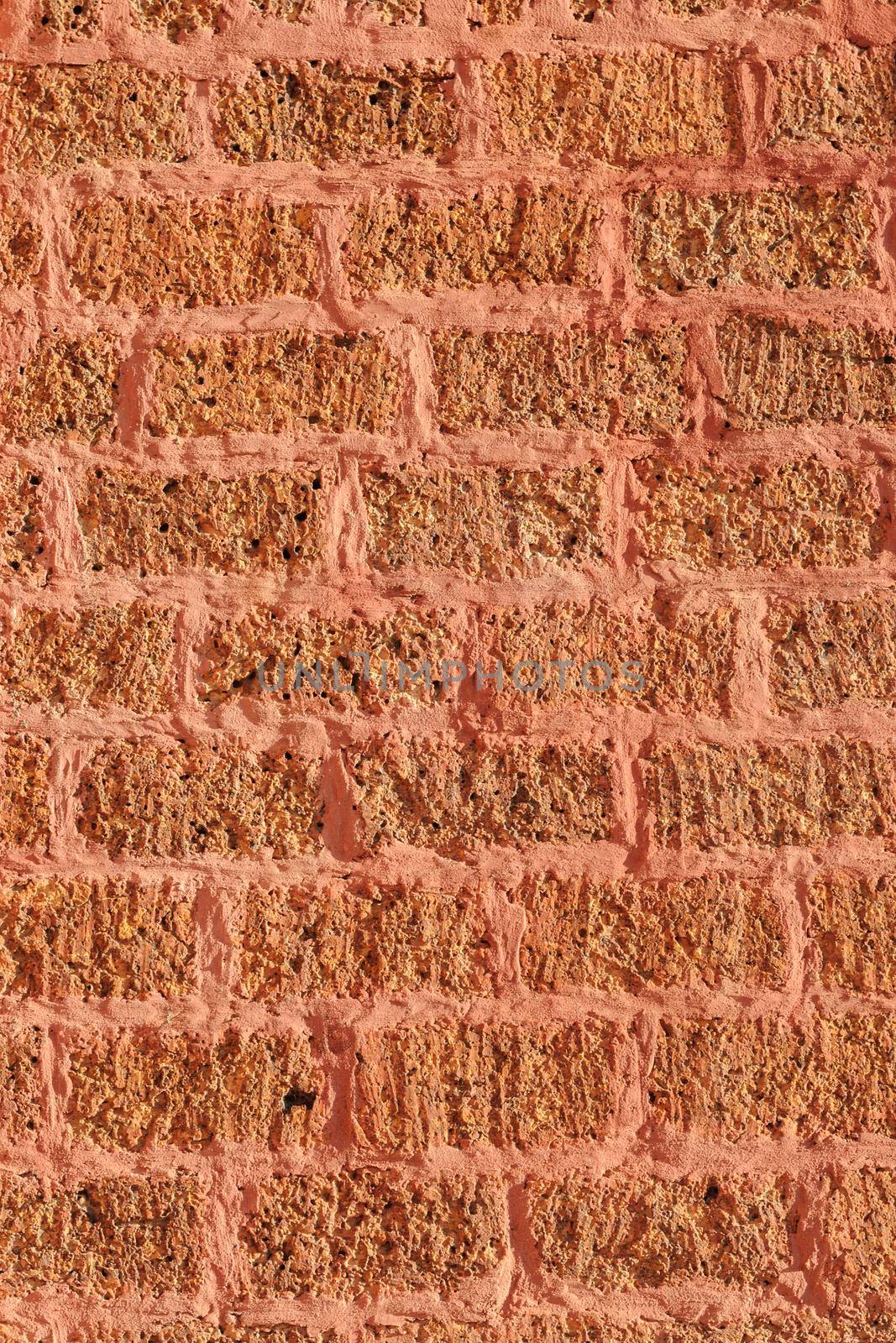 abstract ancient orange laterite brick wall, brick wall texture