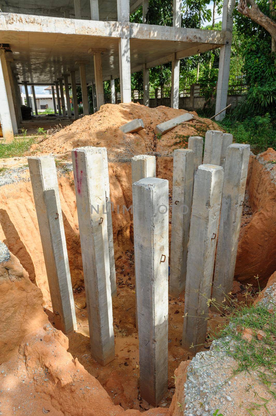 closeup foundation pilein construction site, the building under construcion