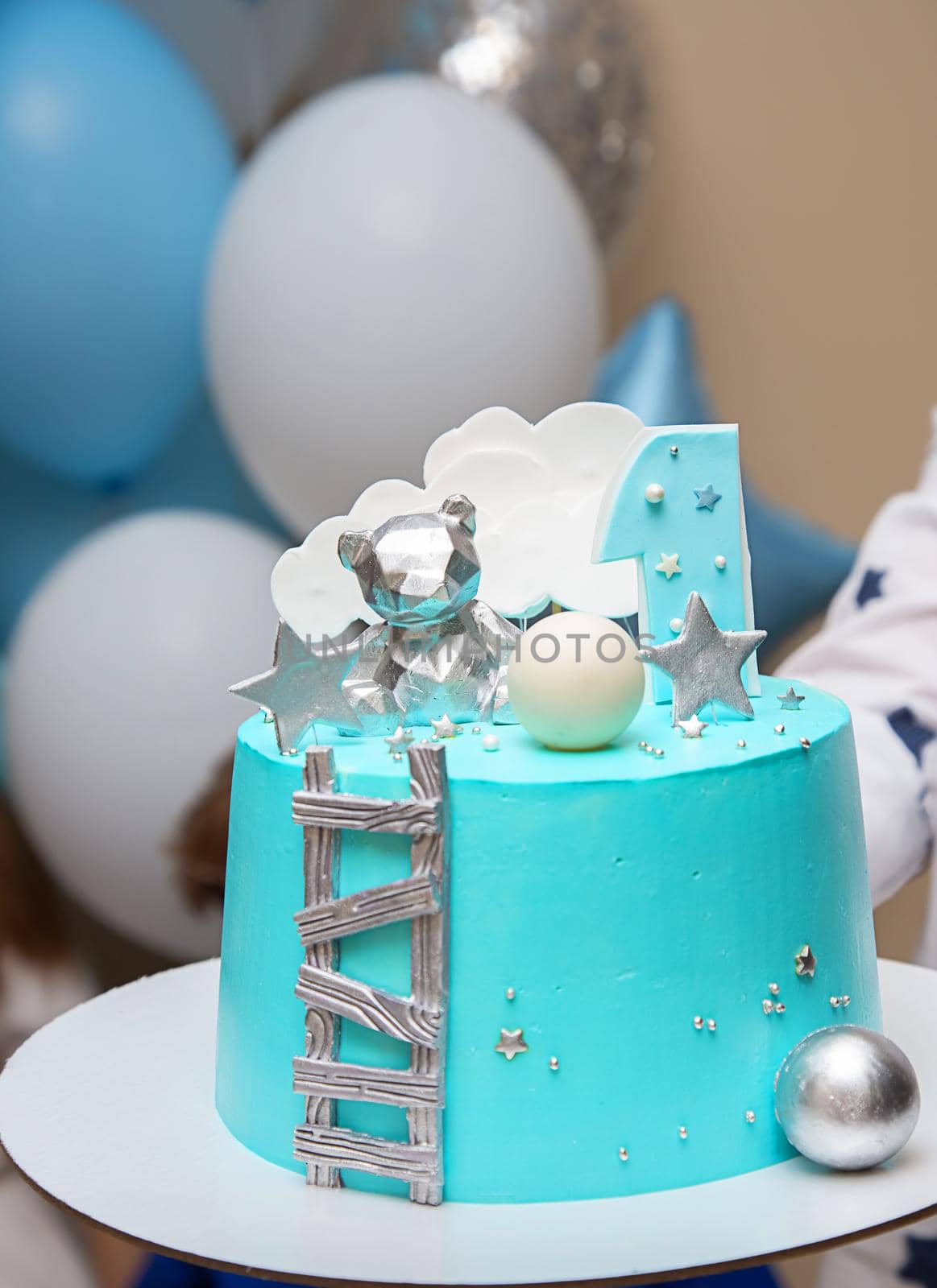 Birthday cake with light blue mirror glaze. Chocolate decor and number one. by galinasharapova