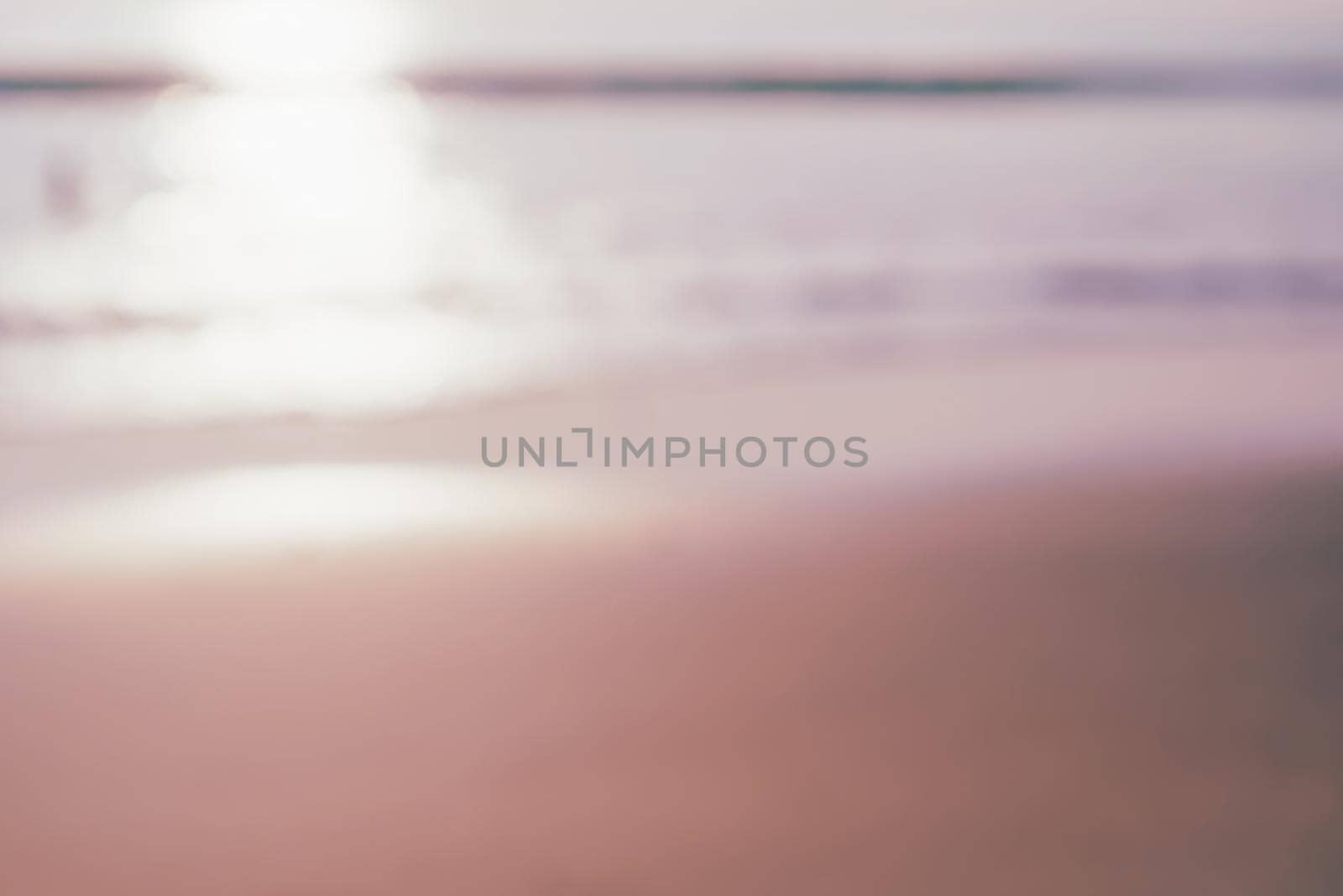 Blur tropical nature clean beach sunset sky time with sun light. by Suwant