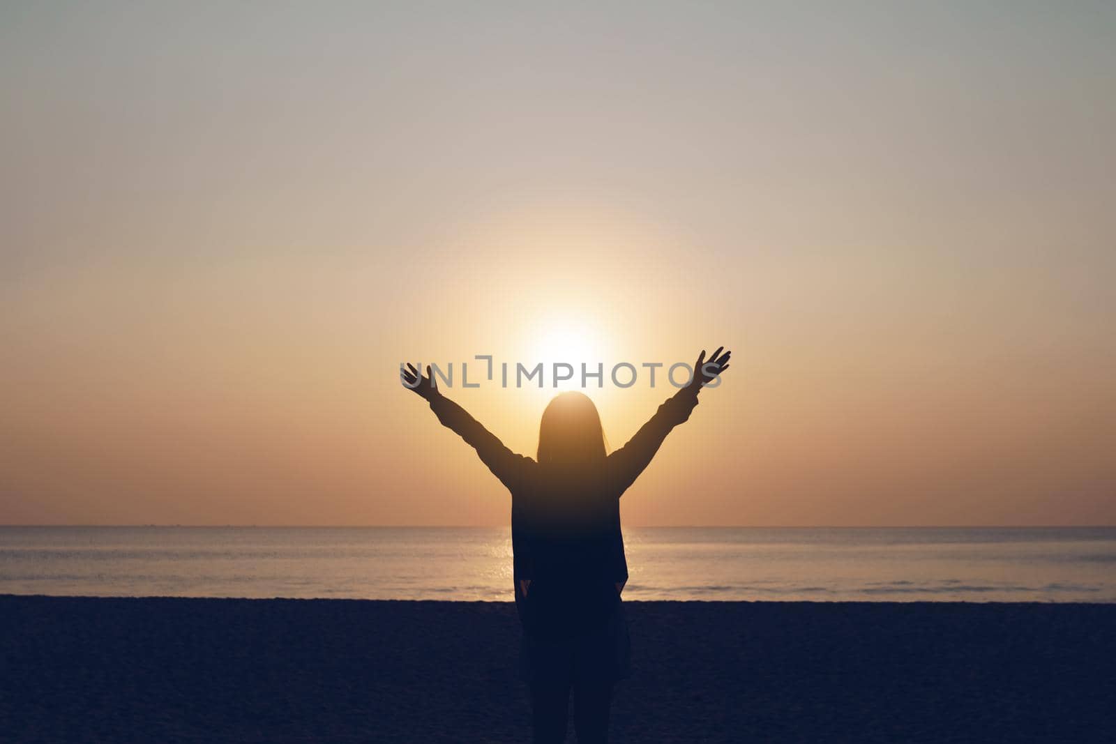 Woman travel around the world with summer sunset beach freedom and relax life concept