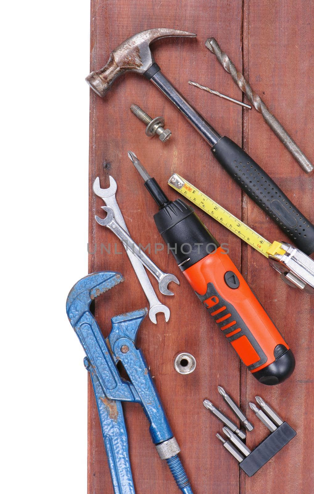 tools on wooden plank background