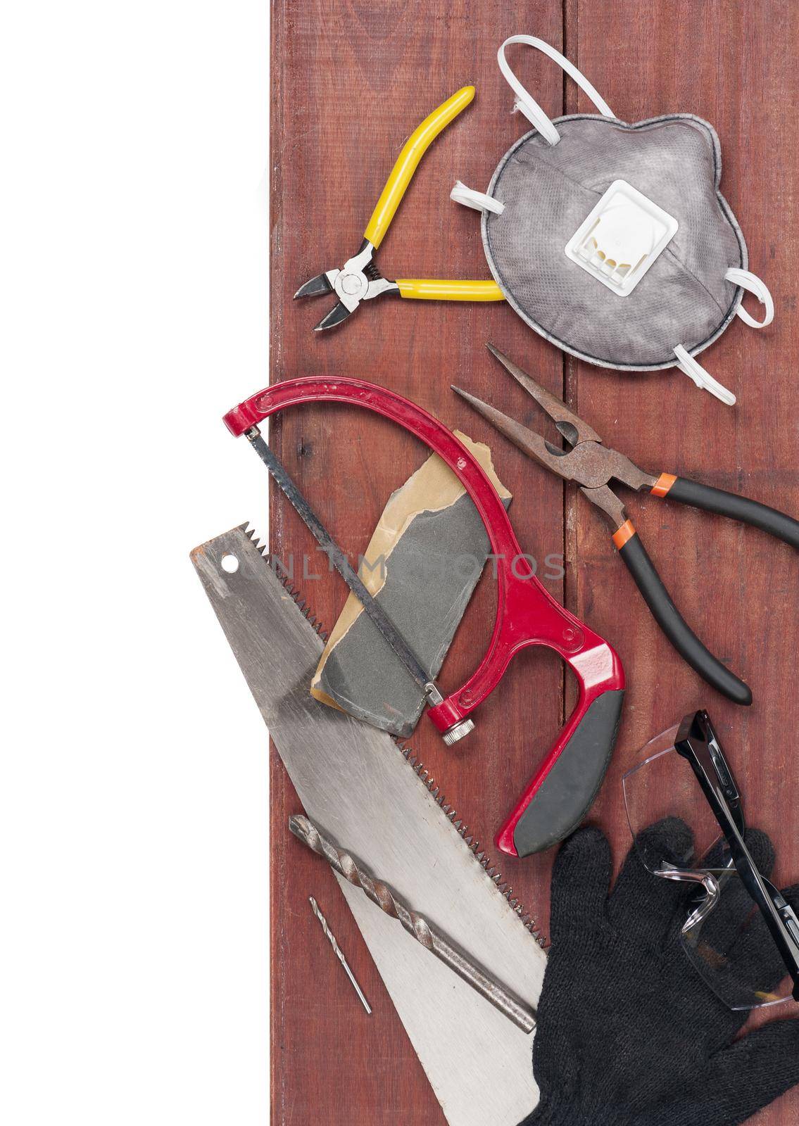tools on wooden plank background