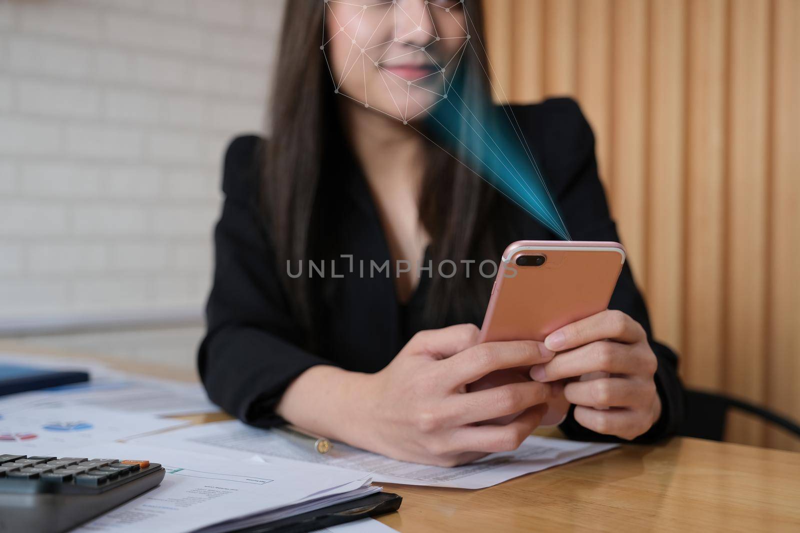 A businesswoman completes KYC using an online banking program in order to open a digital savings account. The definition of cyber security.