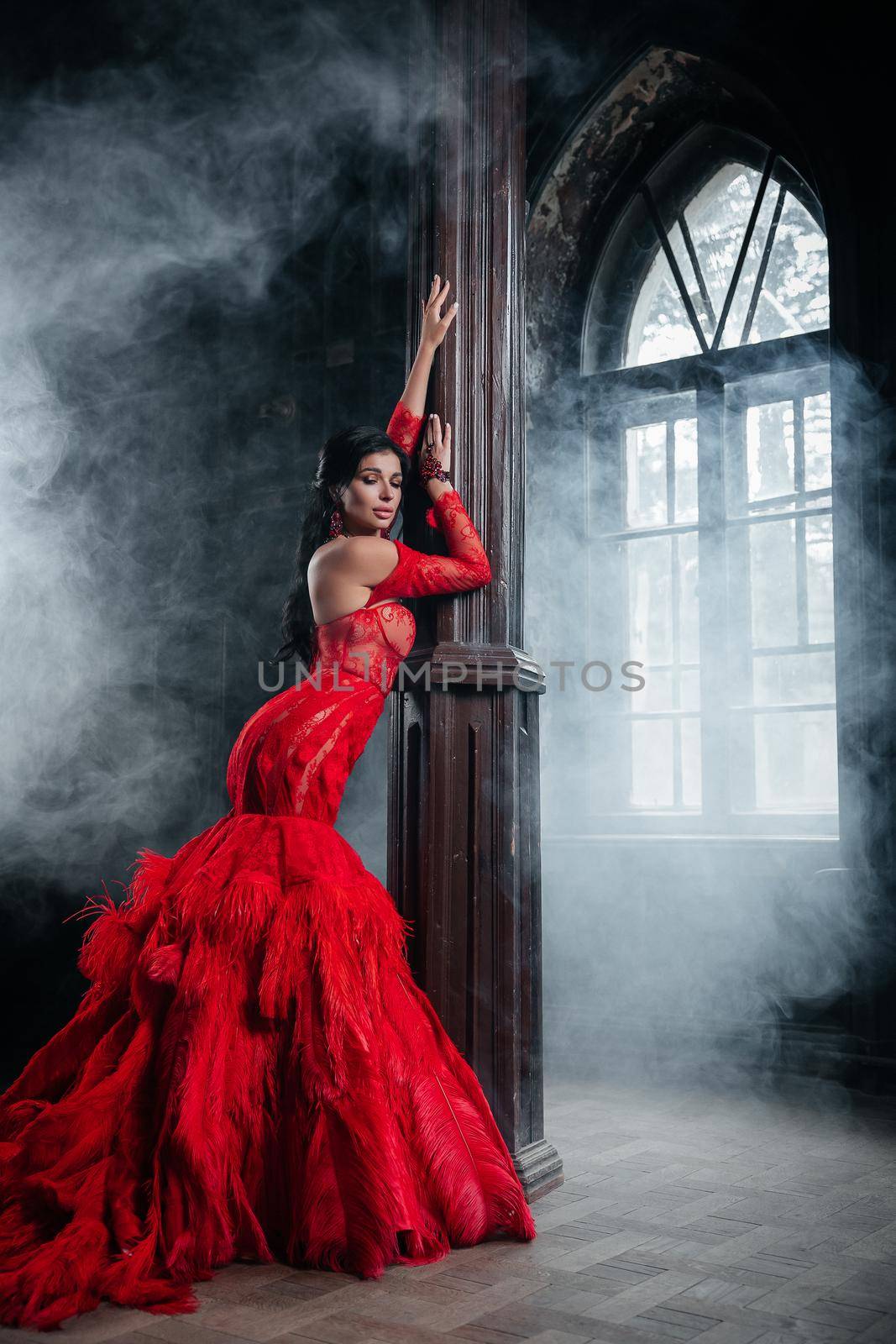 Woman Vintage Red Dress Old Castle Beautiful Princess In Seductive Dress Elegant Caucasian Female Fairy Tale story Near Big Window With Smoke Fog