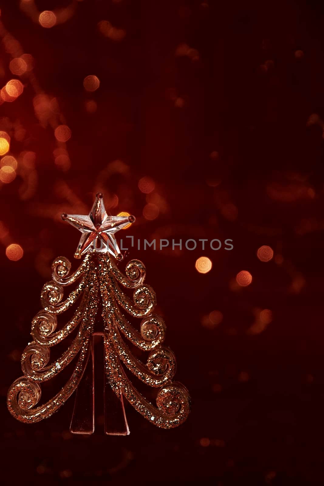 Christmas glass herringbone. New Year's souvenir. Festive postcard on a red background
