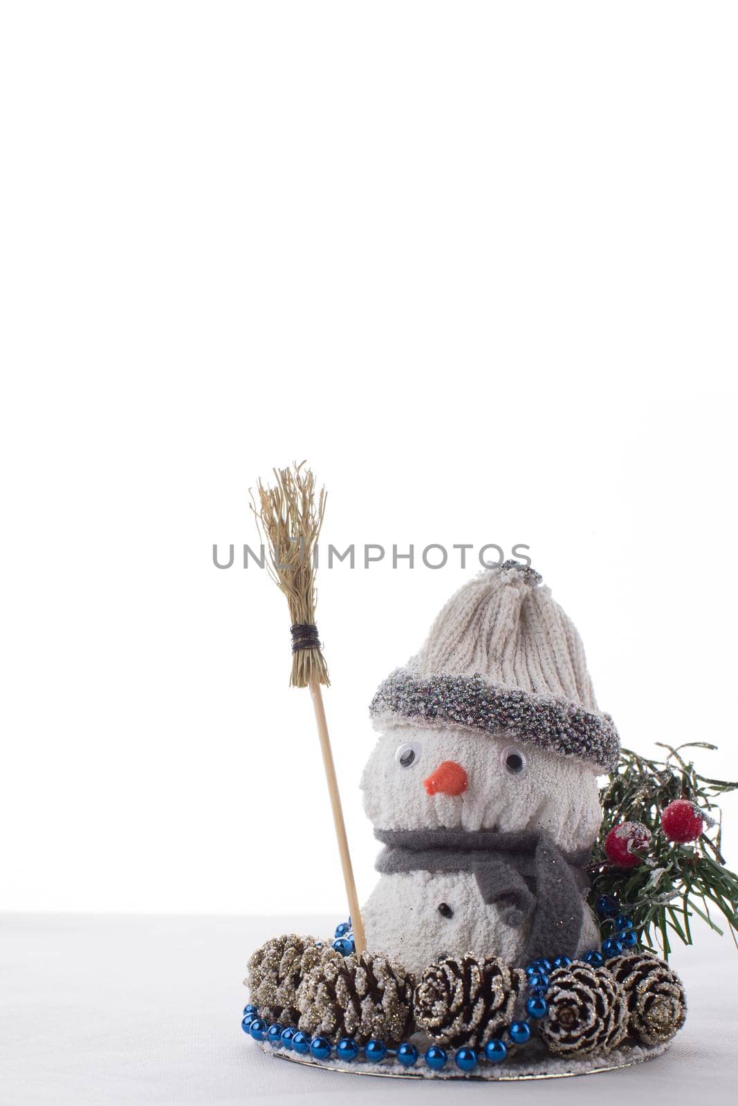 New Year card. New Year's background with a snowman. Toy snowman