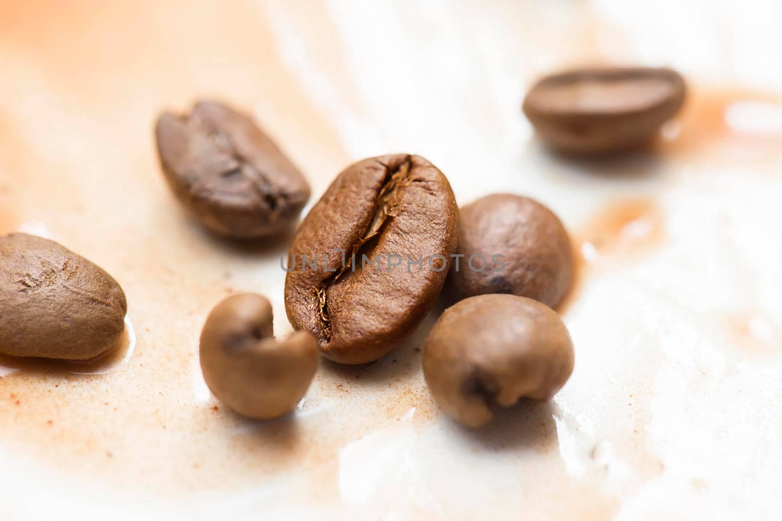 Coffee beans closeup. Sprinkled coffee