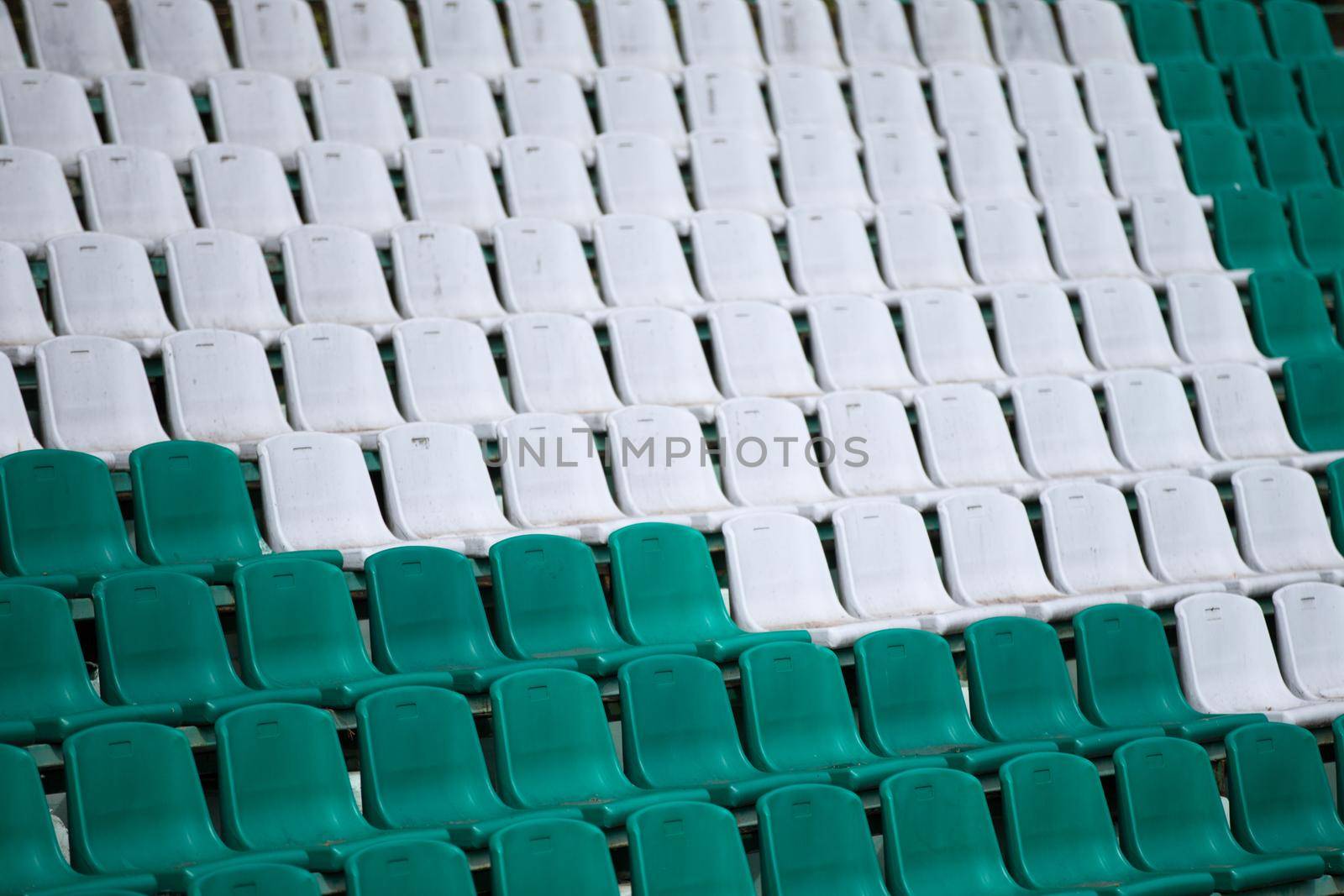Spotting chairs in the stadium.Places for fans