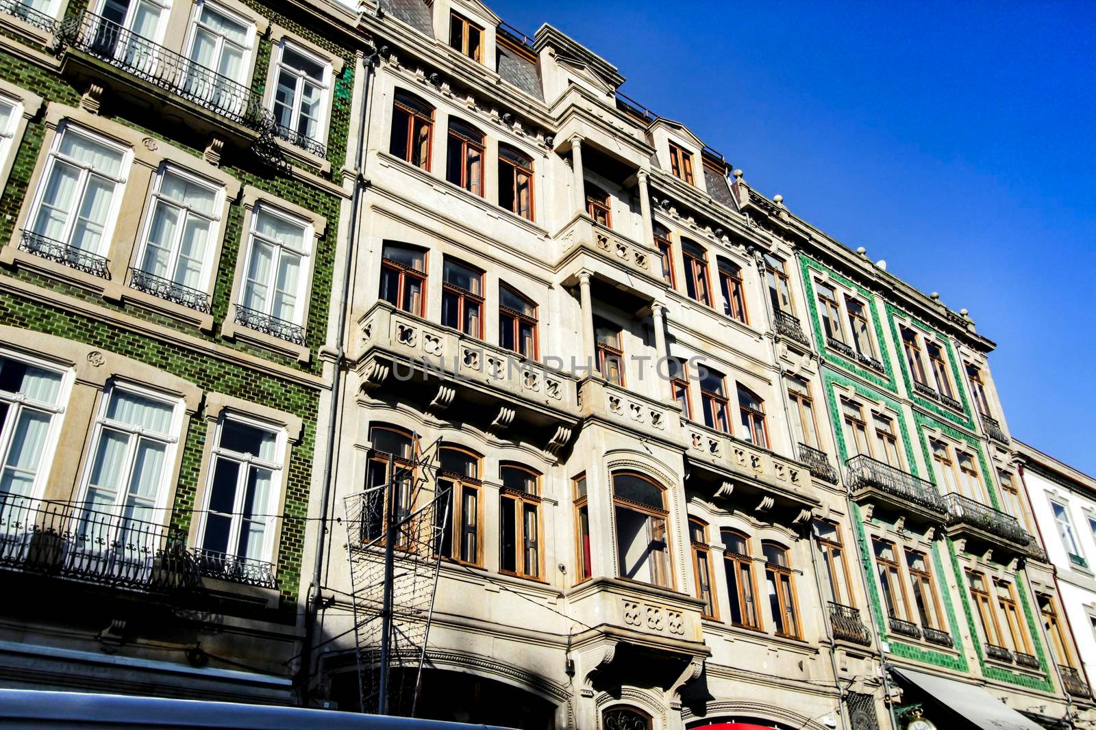 Beautiful and old colorful tiled facades in Porto city in January