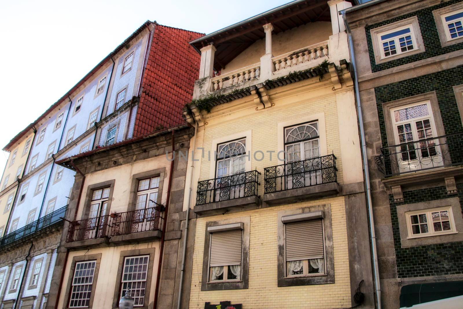 Beautiful and old colorful tiled facades in Porto city in January