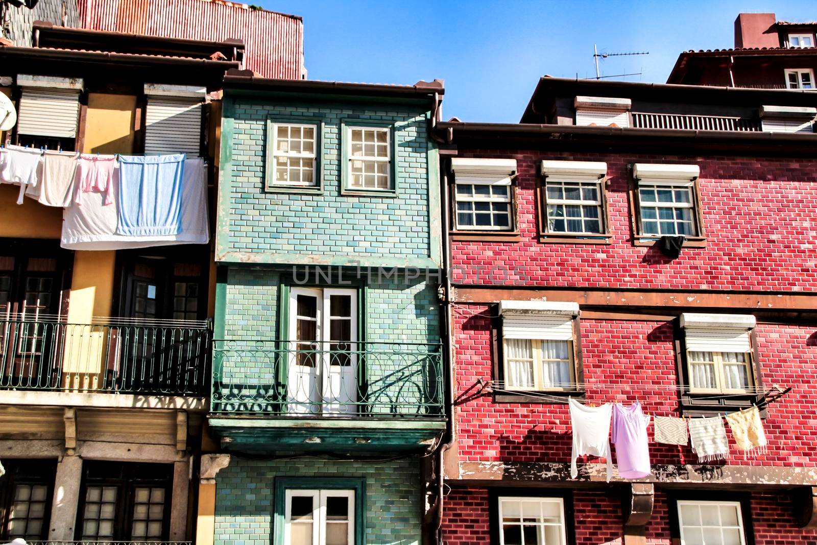 Beautiful and old colorful tiled facades in Porto city in January