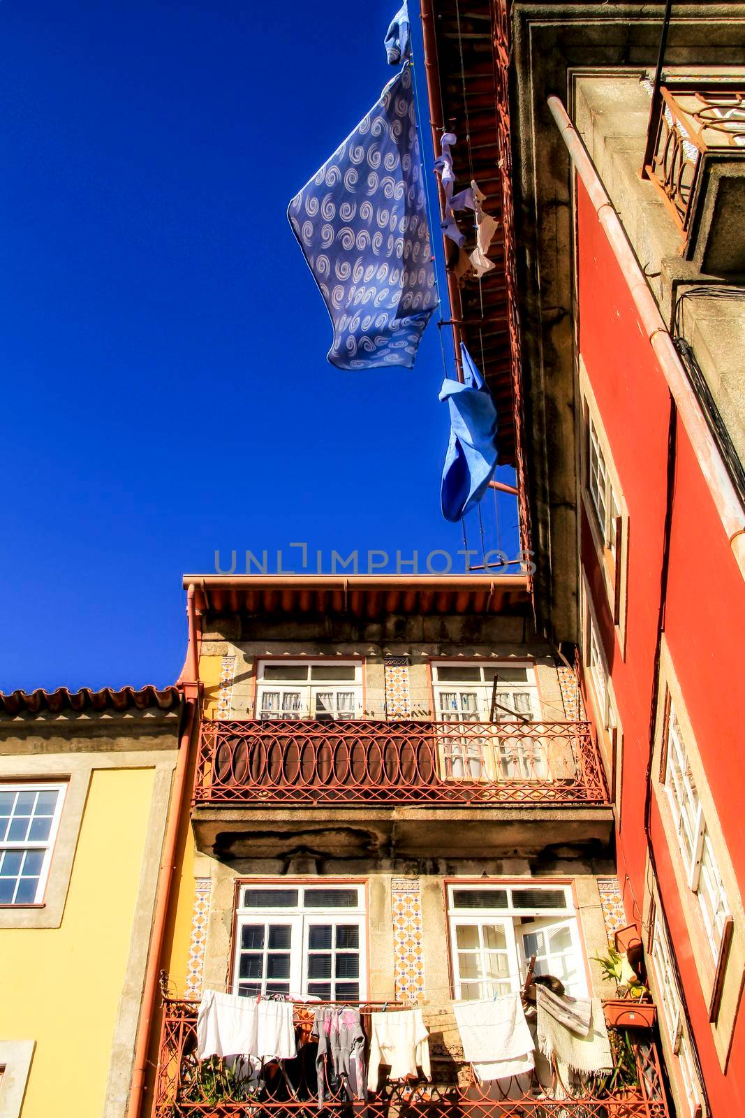 Beautiful and old colorful tiled facades in Porto city in January