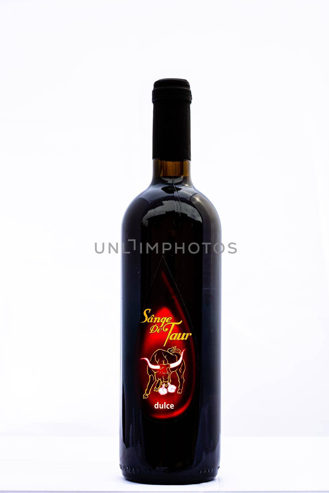 Bottle of Sange de Taur wine isolated on white. Illustrative editorial photo shot in Bucharest, Romania, 2021 by vladispas