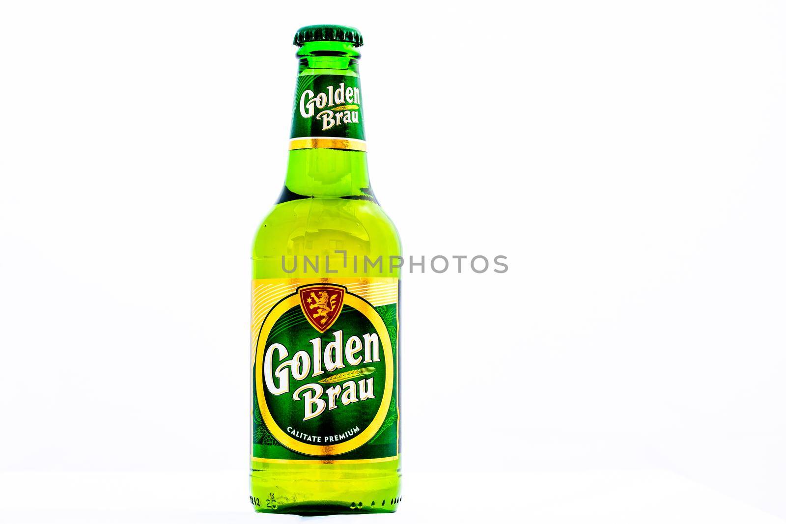 Bottle of Golden Brau beer isolated on white. Illustrative editorial photo shot in Bucharest, Romania, 2021