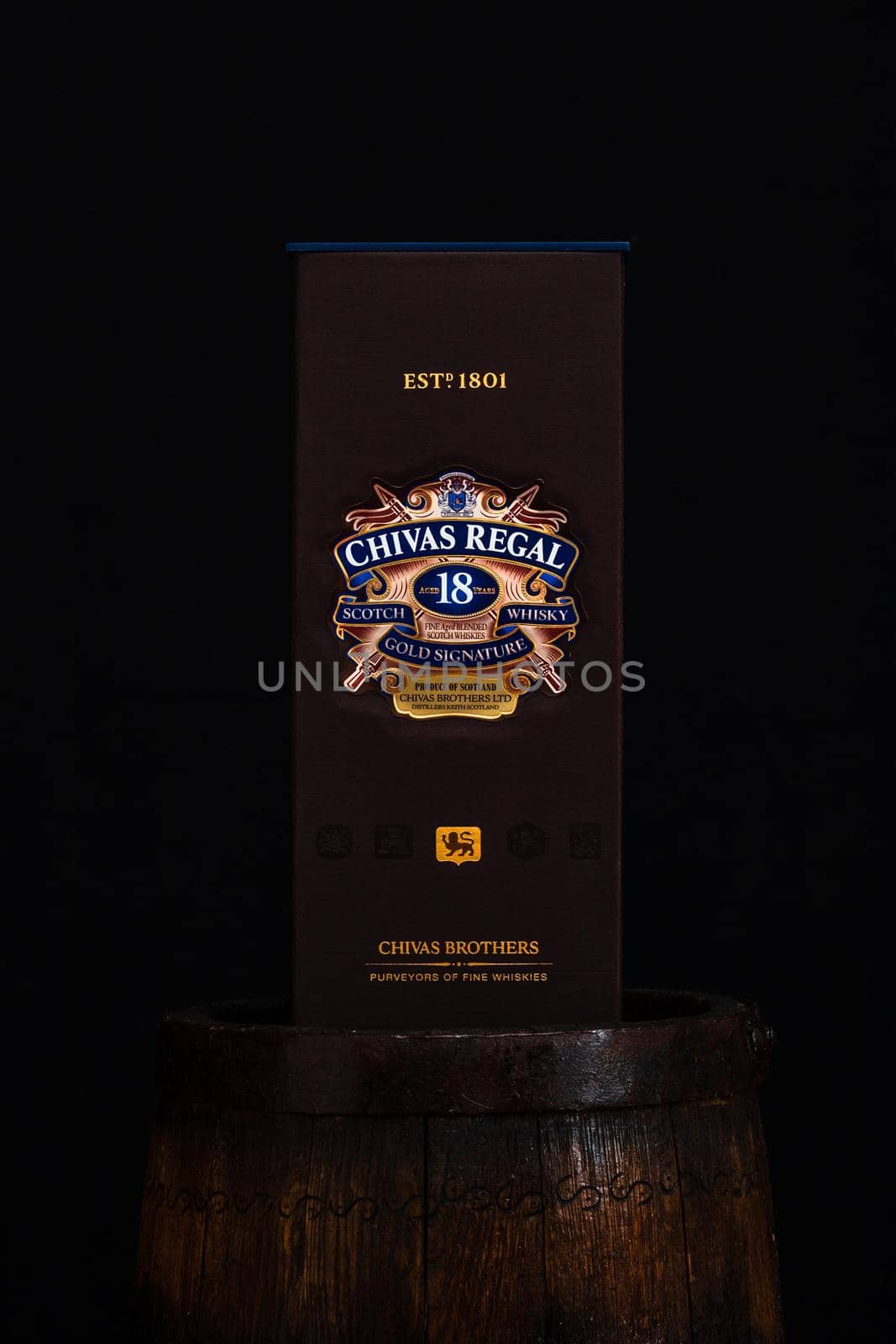 Chivas Regal 18 is blended from whiskies matured for at least 18 years. Whisky bottle on barrel. Illustrative editorial photo Bucharest, Romania, 2021