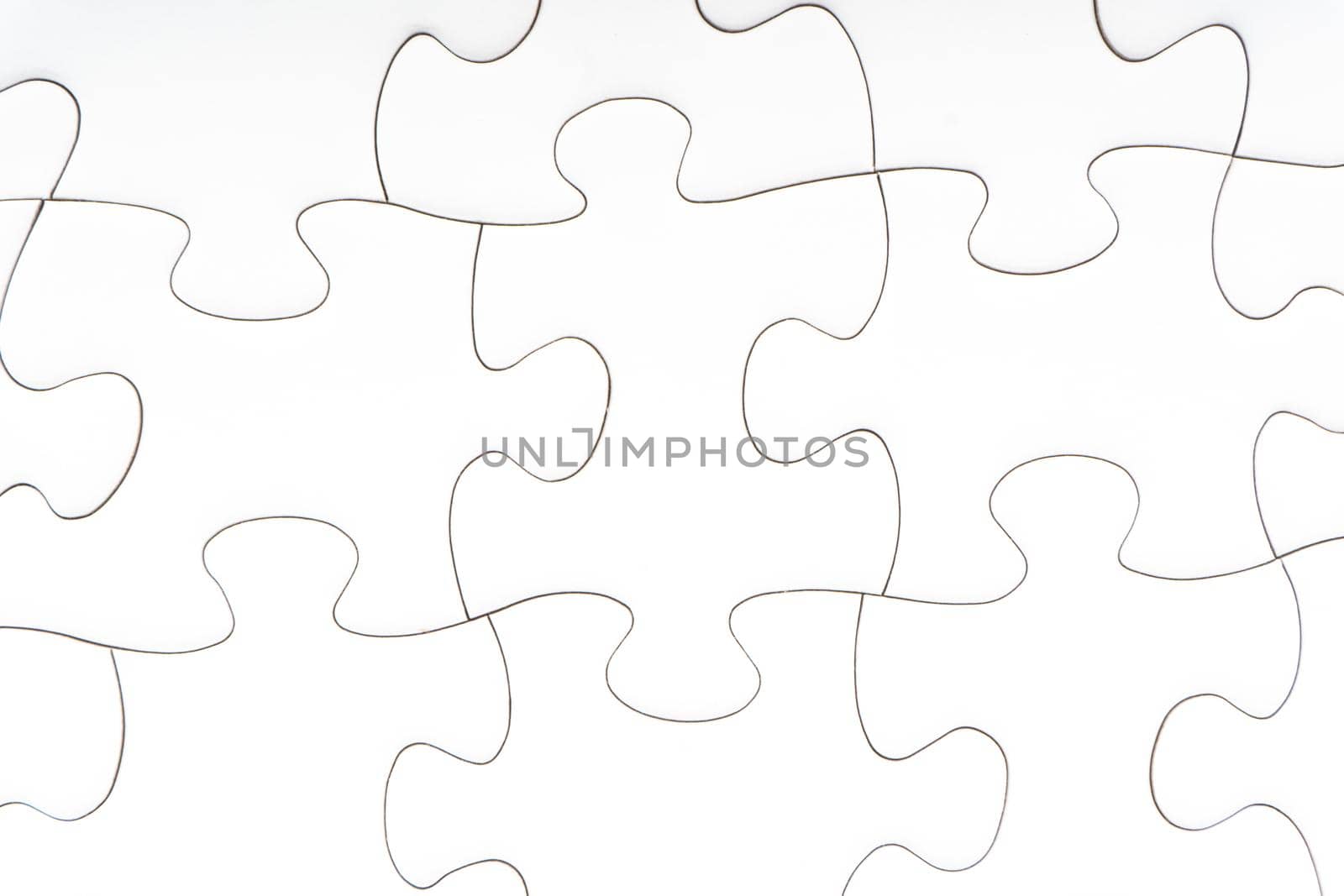 Jigsaw puzzle pieces background. Copy space and business concept