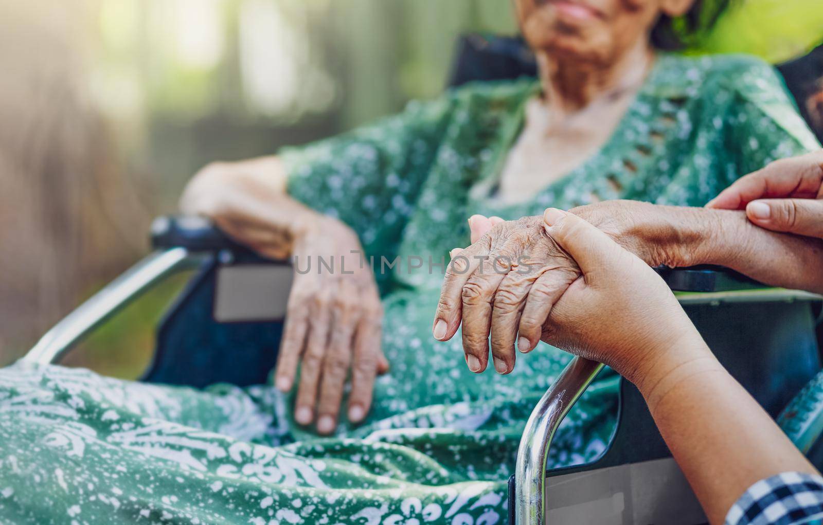 Elderly asian woman on wheelchair at home with daughter take care by toa55