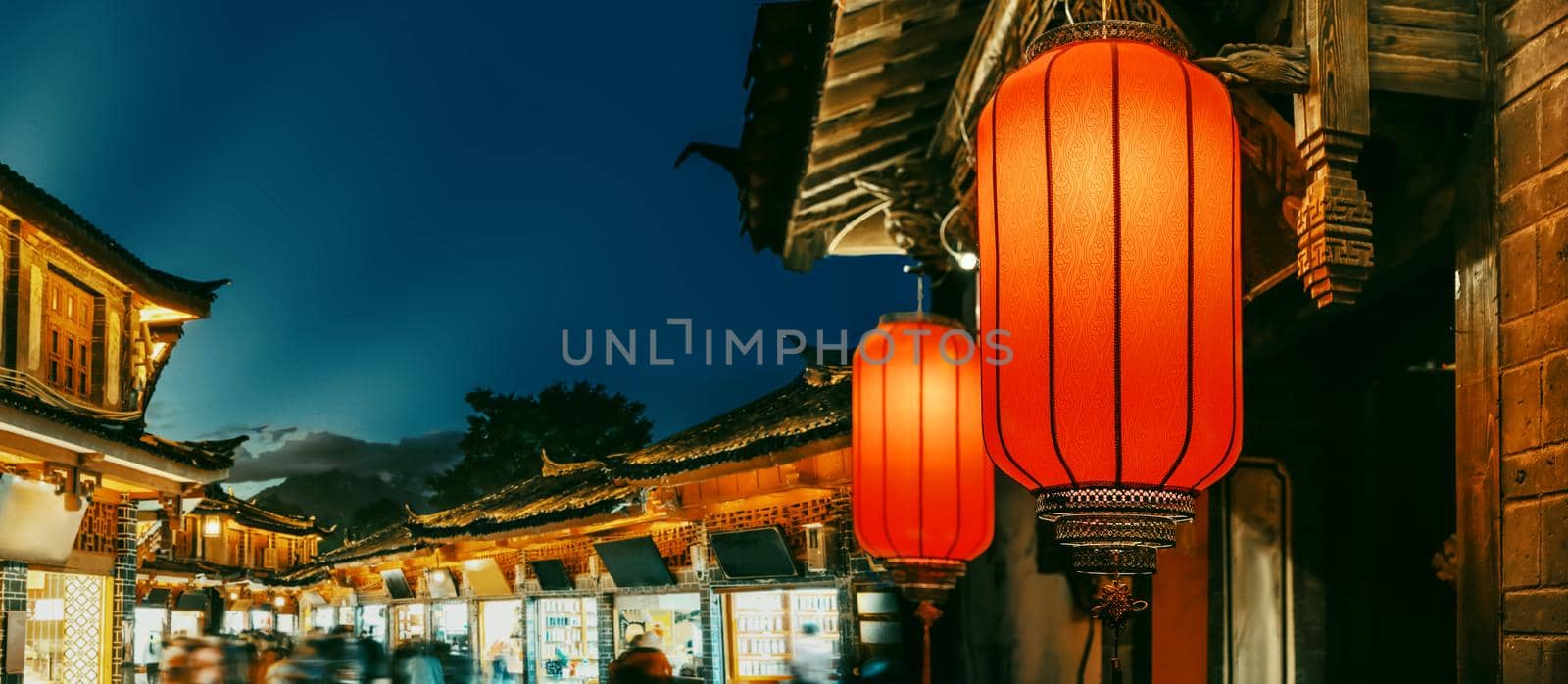 Lijiang old town in the evening with crowed tourist.