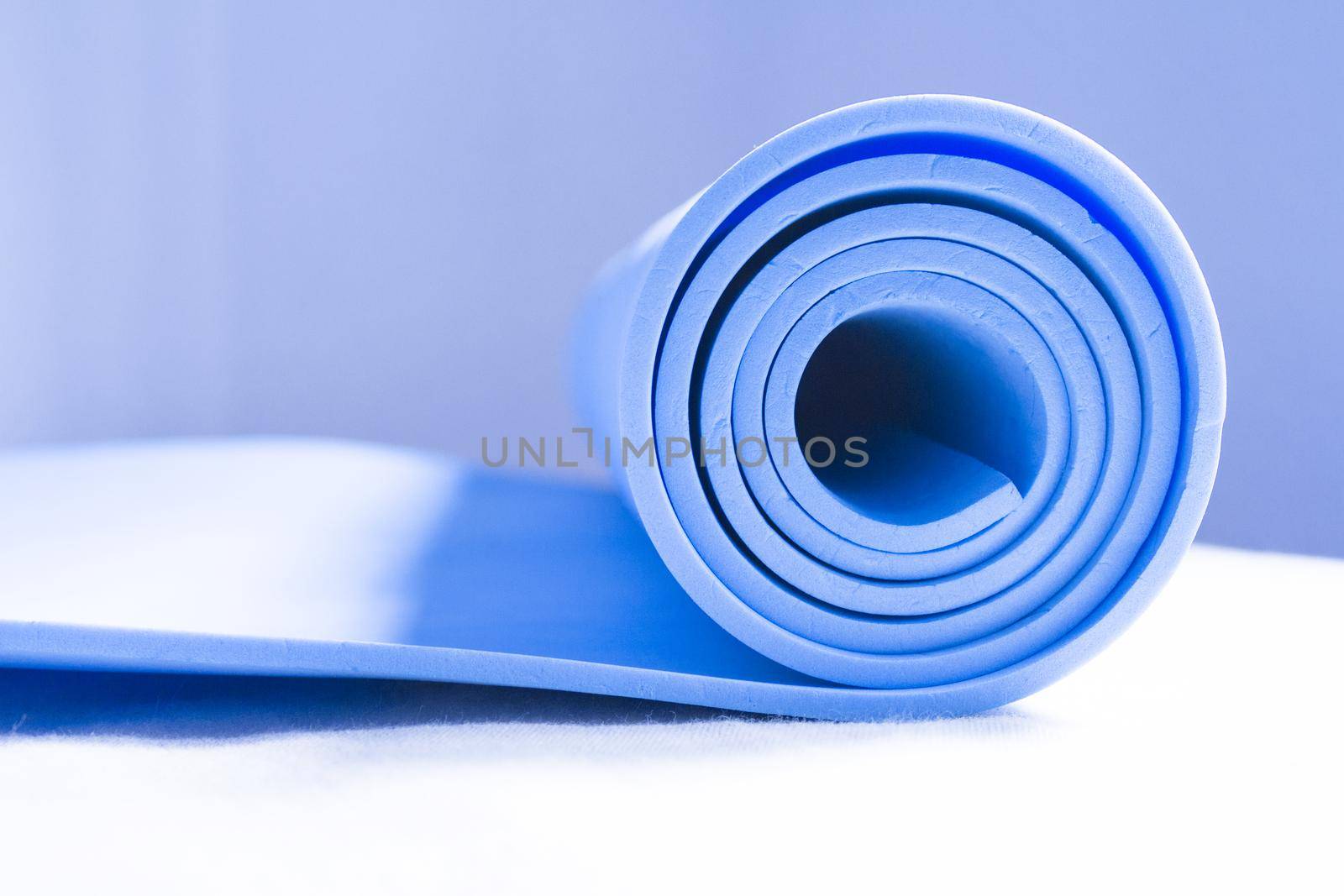 Mat for practicing yoga, pilates and stretching exercises. No people