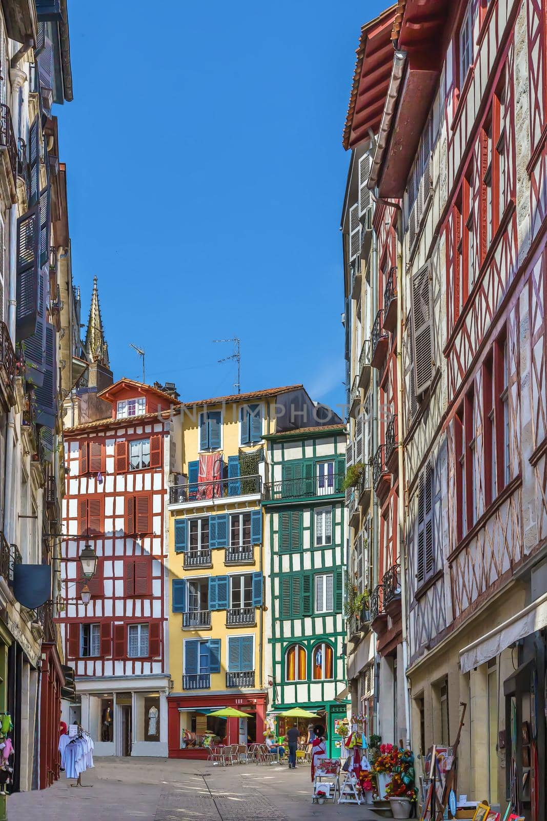 Street with historical houses in Bayonne city center, France