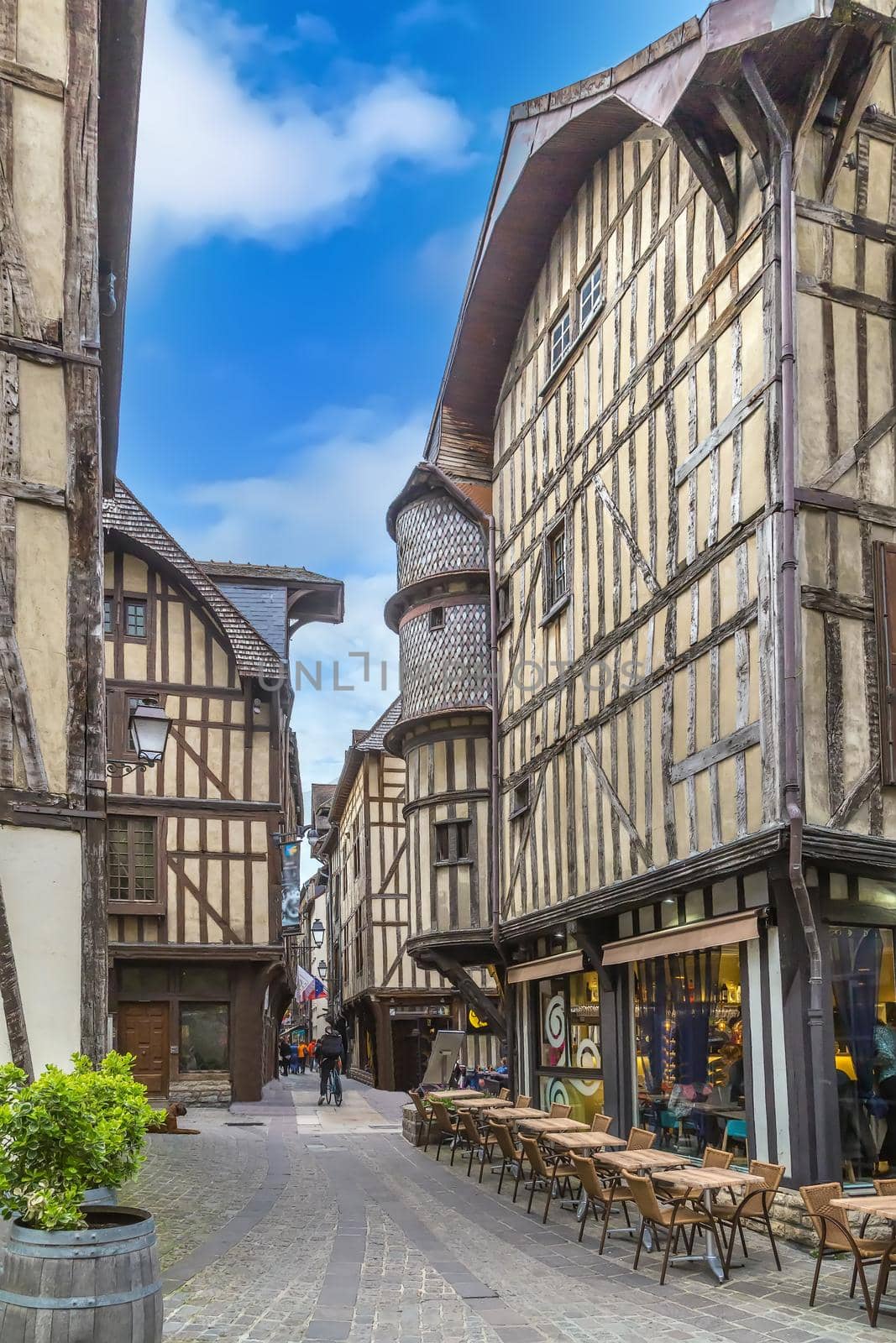 Street with historical half-timbered houses in Troyes, France