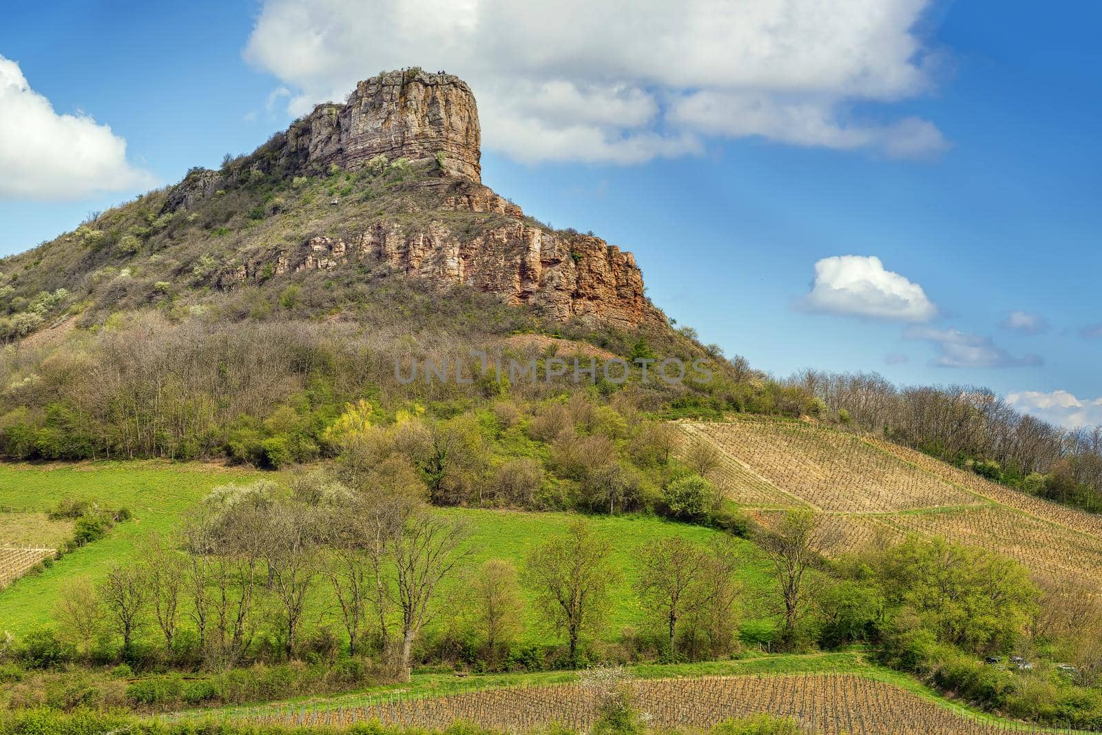 Rock of Solutre (French: Roche de Solutre), is a limestone slope 8 km west of Macon, France