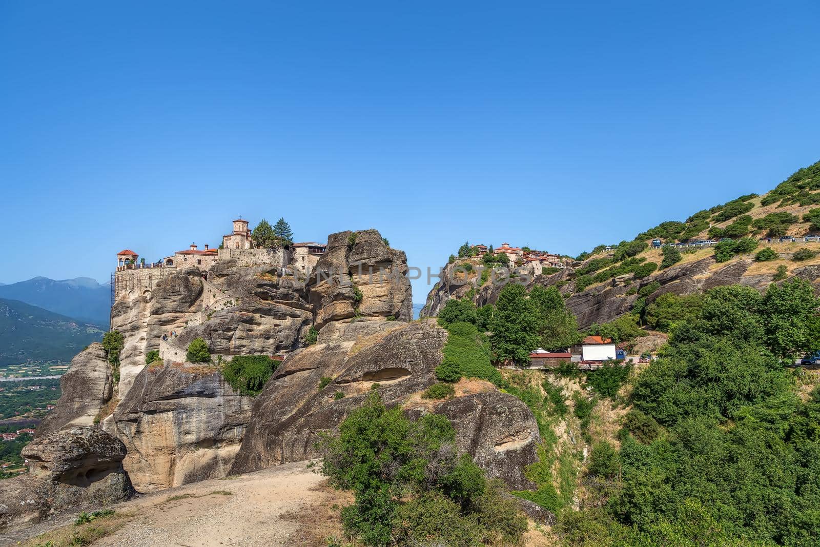 View of rock with Monastery of Varlaam and Great Meteoron in Meteora, Greece