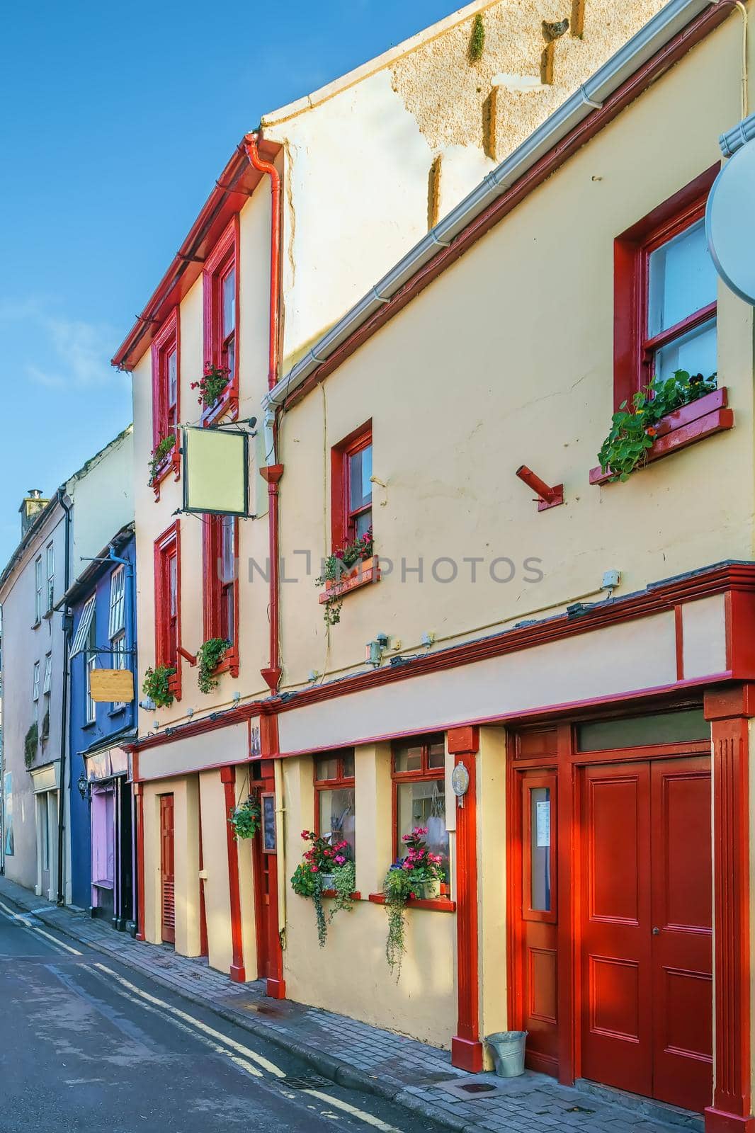 Street with bright colored houses  in Kinsale, Ireland