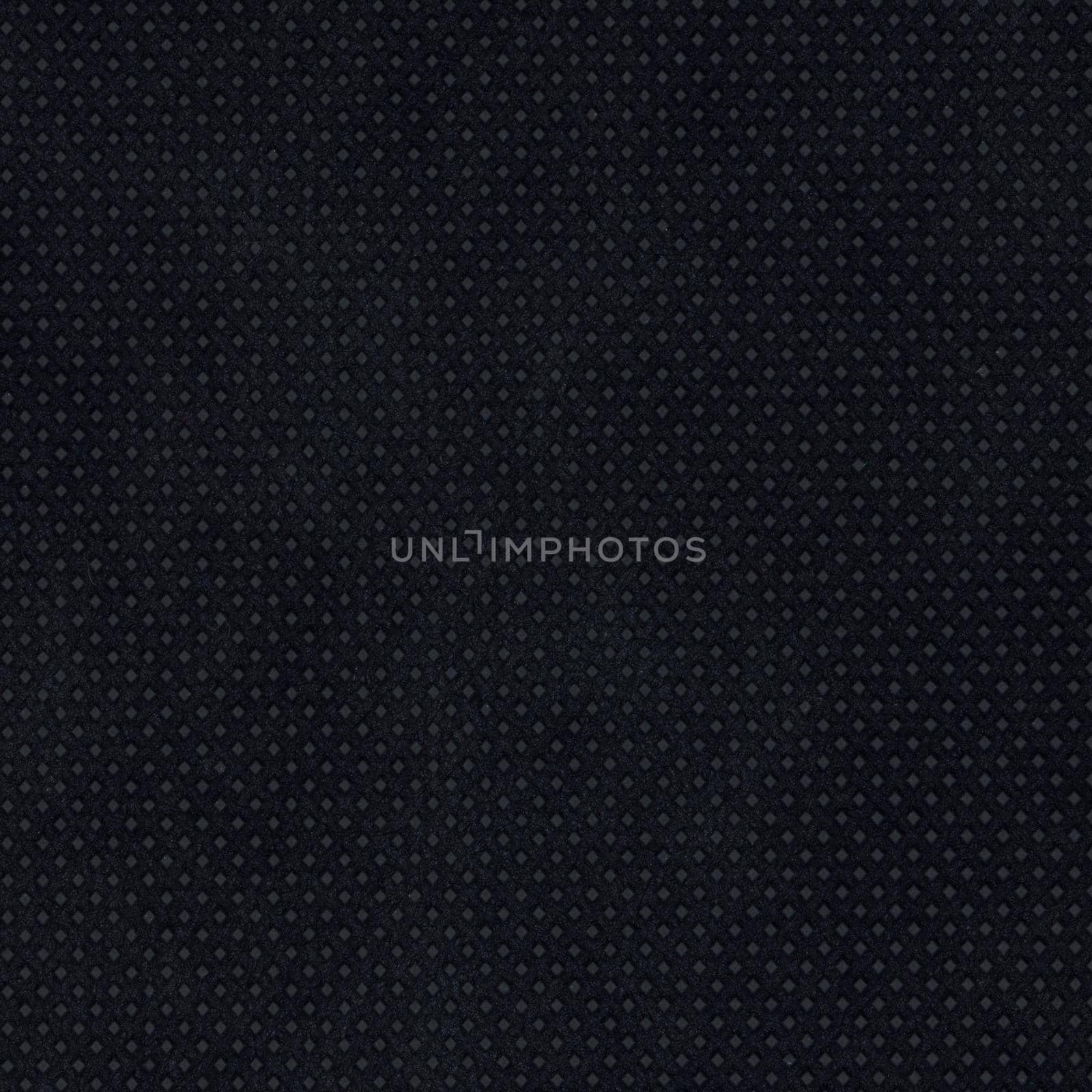 black nonwoven polypropylene fabric texture background by claudiodivizia