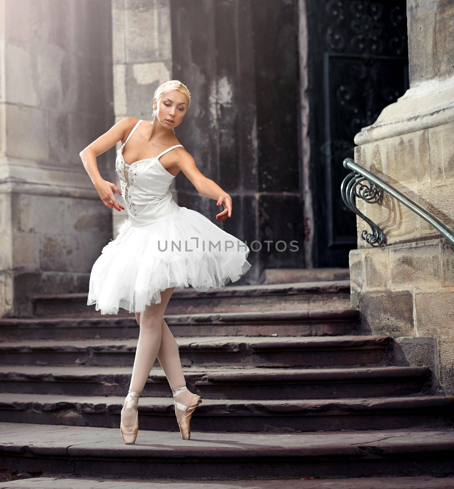 Dancing is her love. Soft focus shot of a beautiful ballerina practicing her ballet moves