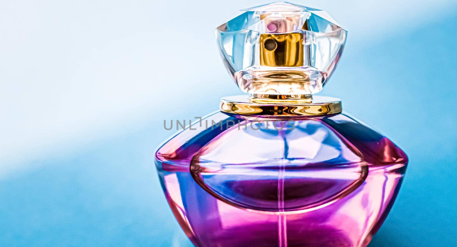 Perfume bottle on glossy background, sweet floral scent, glamour fragrance and eau de parfum as holiday gift and luxury beauty cosmetics brand design.