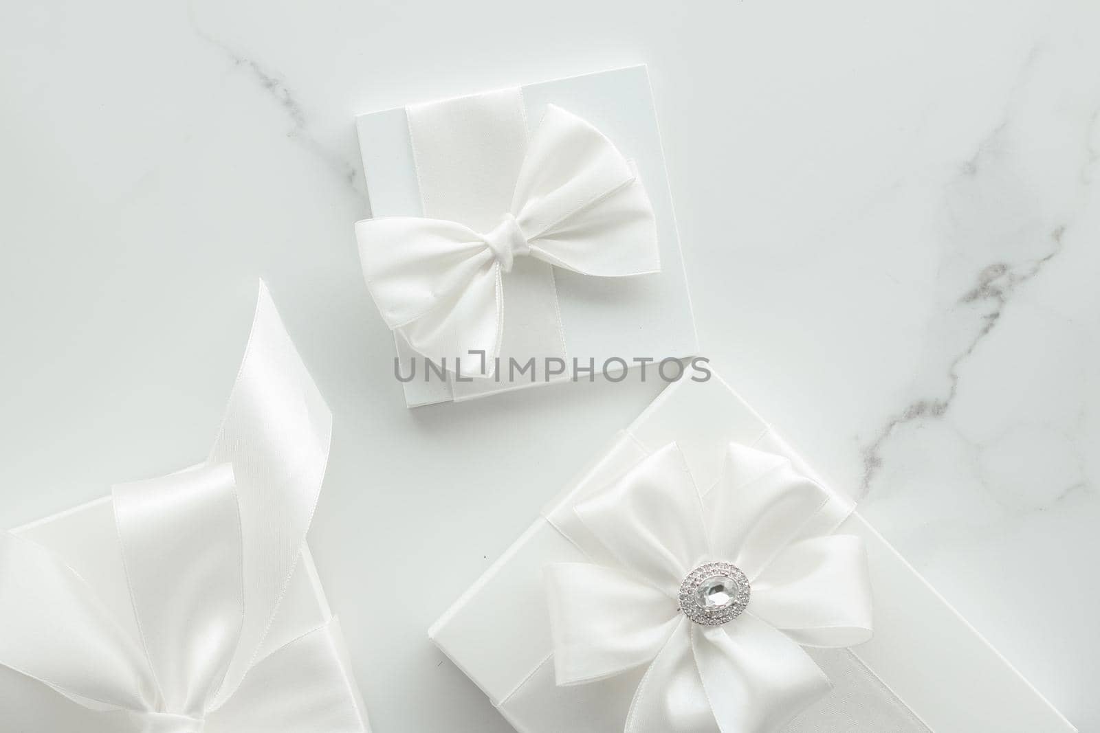 Romantic celebration, lifestyle and holiday present concept - Luxury wedding gifts on marble