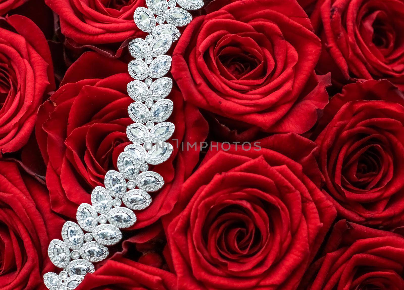 Gemstone jewellery, wedding fashion and luxe shopping concept - Luxury diamond bracelet and bouquet of red roses, jewelry love gift on Valentines Day and romantic holidays present