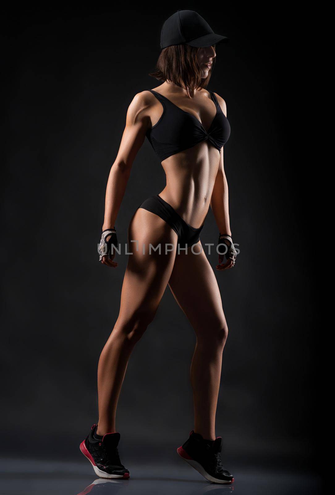 She is motivation. Full length studio shot of a fitness woman wearing workout clothing posing showing off her perfect strong body