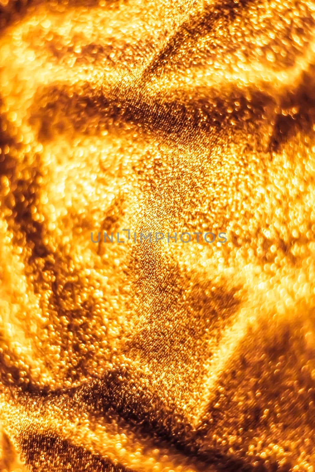 Luxe glowing texture, night club branding and New Years party concept - Golden holiday sparkling glitter abstract background, luxury shiny fabric material for glamour design and festive invitation