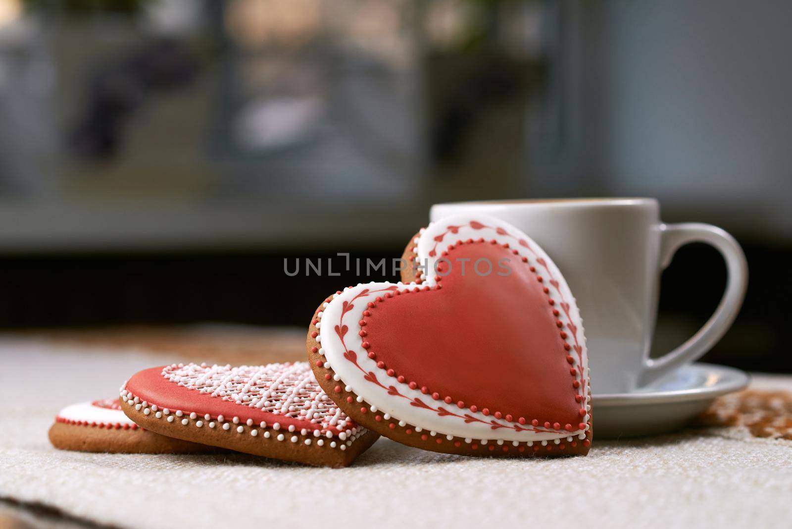 Saying I love you. Valentine s day cup of coffee with red heart shaped cookies