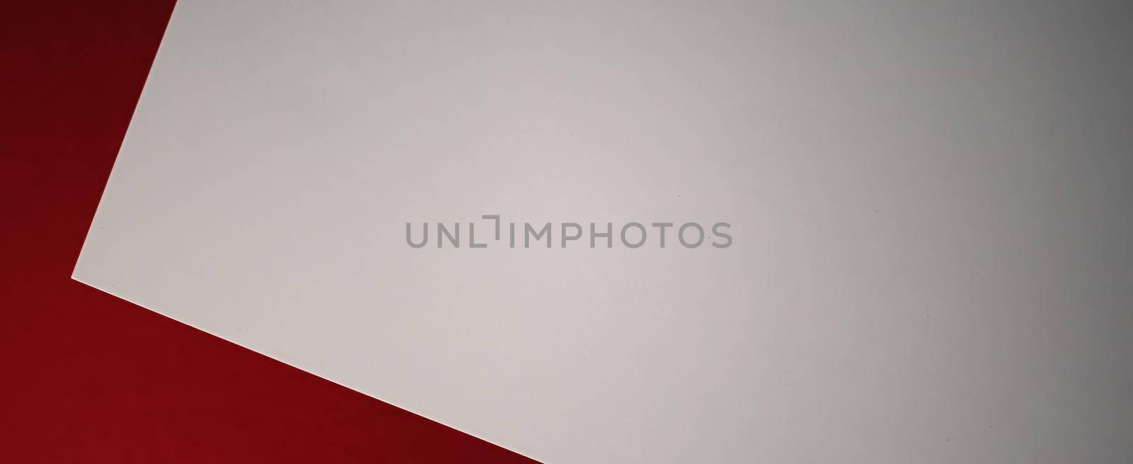 Blank A4 paper, white on red background as office stationery flatlay, luxury branding flat lay and brand identity design for mockup.